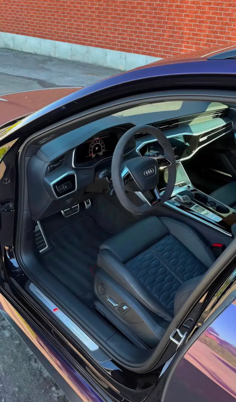 Audi interior with diamond-stitched sport seats detailed to showroom condition