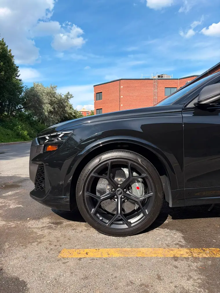 Audi RS Q8 matte black wheel with red calipers and carbon-ceramic brakes