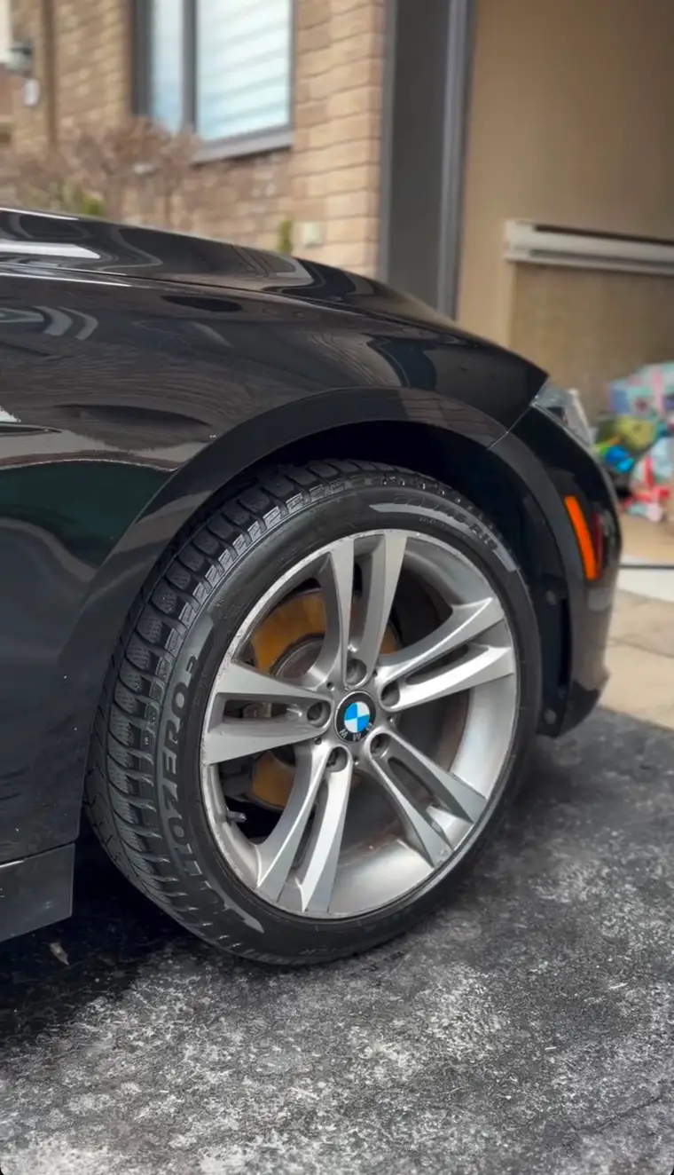 BMW twin-spoke wheel cleaned to a factory finish