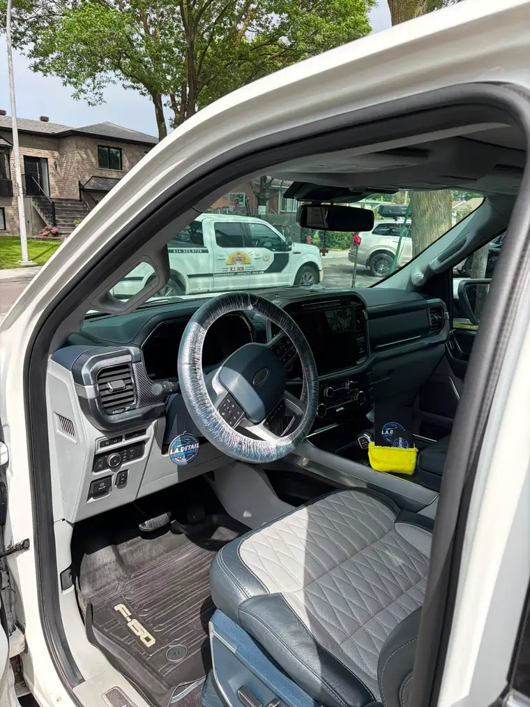 Ford F-150 Limited cabin with quilted leather seats cleaned and conditioned