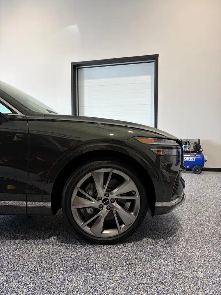 Genesis GV70 wheel and fender line after full exterior detail