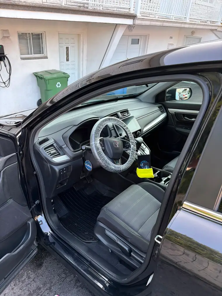 Honda CR-V interior after a deep clean, dash and cloth seats refreshed