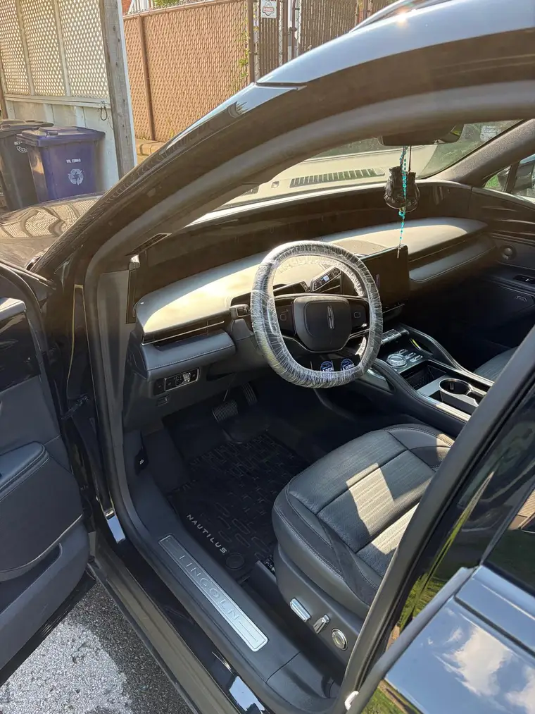 Lincoln Nautilus interior detailed, steering wheel wrapped for delivery