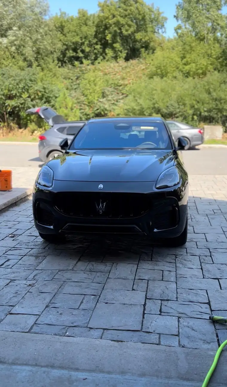 Black Maserati Grecale freshly detailed in a Montreal driveway