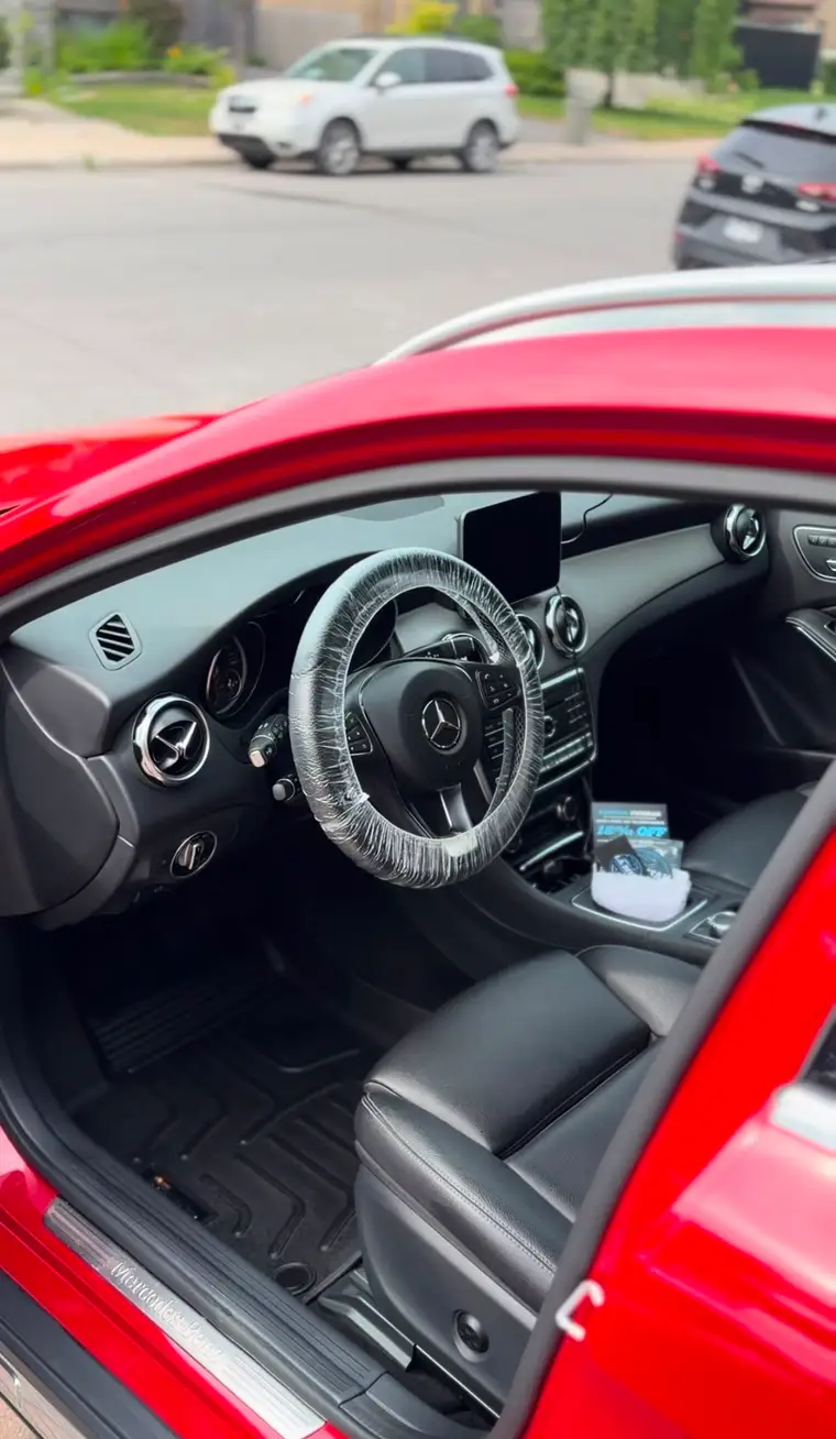Mercedes interior detailed, steering wheel wrapped for delivery
