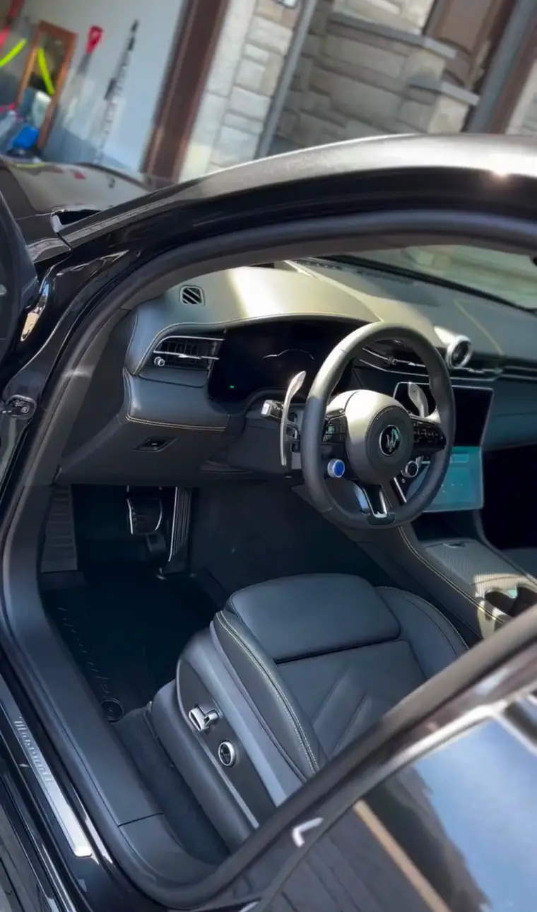 Sport sedan interior with paddle shifters after a full interior detail