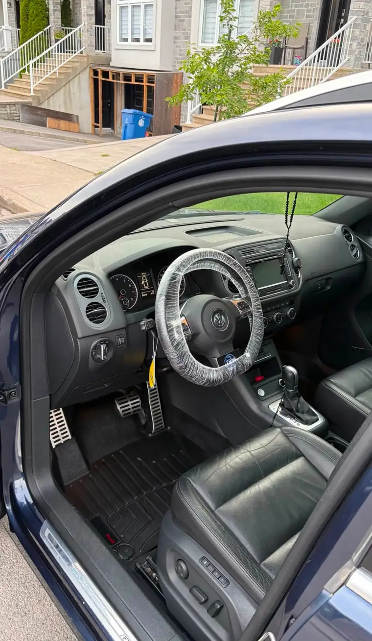 Volkswagen interior with metal pedals and freshly shampooed carpets